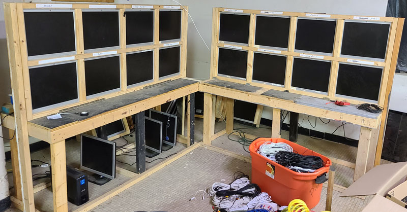 2 Tables with 8 - 17 inch Monitors